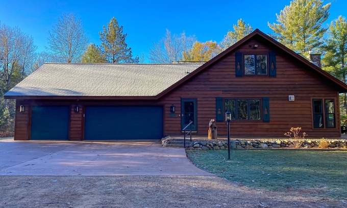 Conover Maison | Lakefront home with game rooms, dock, kayaks, private beach, fireplace, firepit