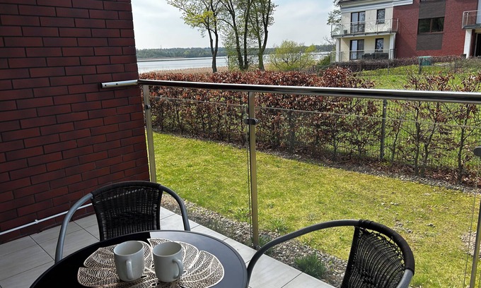 Ostroda Appartement | Lakeside Promenade View Sunset Studio