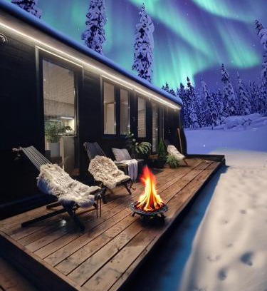 Kolari Chalet De Ski | Lapland Riverside Cabin 5 MUSTIKKA, Ylläs, Tiny Home with Sauna, Fireplace, Terrace, BBQ, Wifi, Ski, Fishing, Pets OK