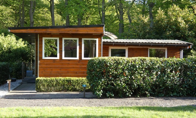 Marum Chalet De Ski | Large chalet for rent in wooded area on border Friesland, Groningen,Drenthe.