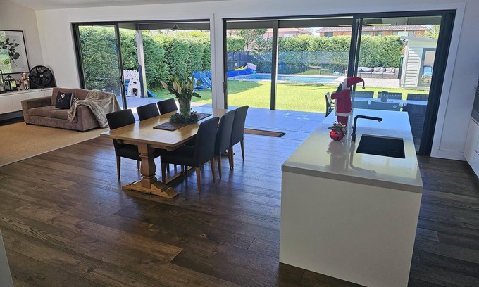 Willoughby Maison | Large, modern, resort-style house with pool, lawns, 4 bedrooms & 2.5 bathrooms