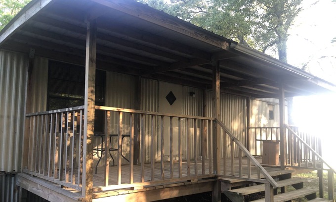 Bastrop Maison | Large porches overlooking acres of lawn and pasture near lakes and rivers.