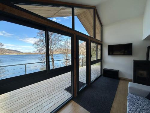 Saint-Theoffrey Chalet De Ski | Le chalet avec sa plage privée