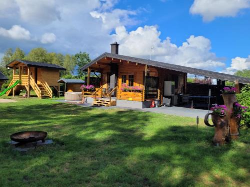 Myszyniec Maison | Letniskowy domek z Bali