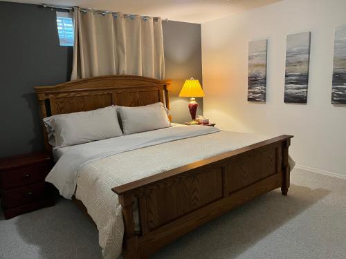 Promontory Maison | Licensed spacious basement suite with one king-size bed
