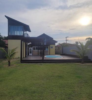 Ibiraquera Maison | LINDA CASA COM PISCINA DE FRENTE PARA A LAGOA