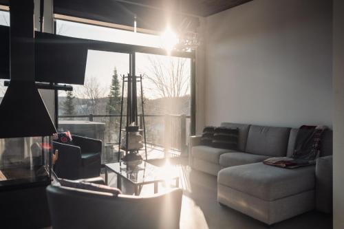 Saint-Faustin-Lac-Carre Appartement | Loft Exécutif CherLieu de luxe avec vue sur golf et montagnes