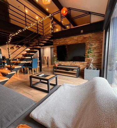 Sainte-Marie-dʼAlloix Appartement | Loft industriel avec jacuzzi