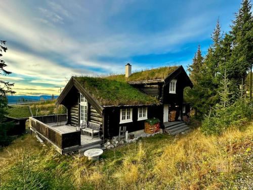 yer Maison | Log cabin in Hafjell with ski in ski out, sauna and view
