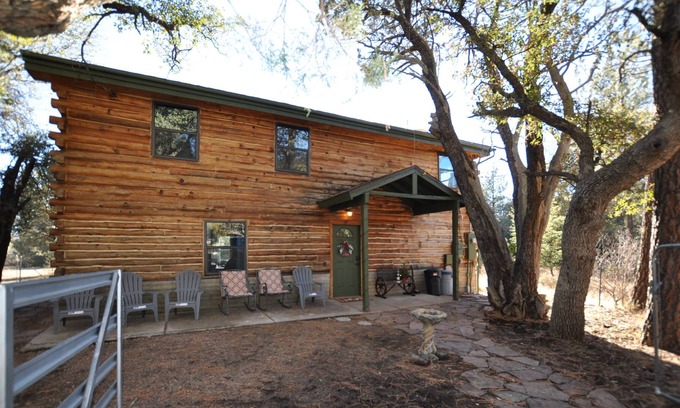Young Cabine | Log cabin on 2.5 private wooded acres! Bring your horses & ATV's. Hunt area 23