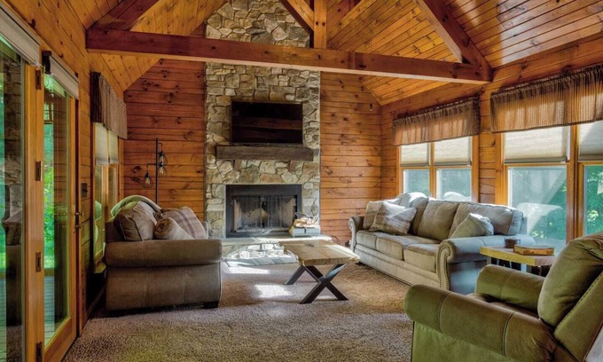 Cedarhurst Cabine | Log Cabin with living room fireplace and hot tub