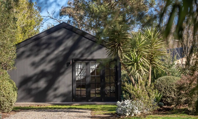 Balnarring Maison | Lomond Cottage Unwind in this charming 1-bedroom hideaway nestled within lush, private gardens. Just