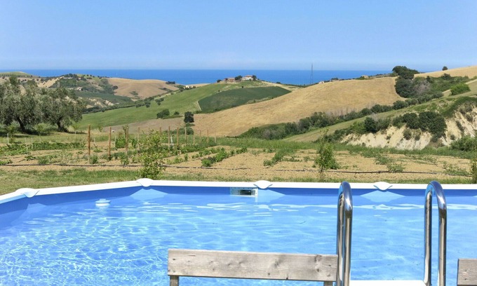 Cologna Spiaggia Villa | Appartement dans une maison de vacances avec climatisation, WIFI, piscine, bain à remous, TV, patio