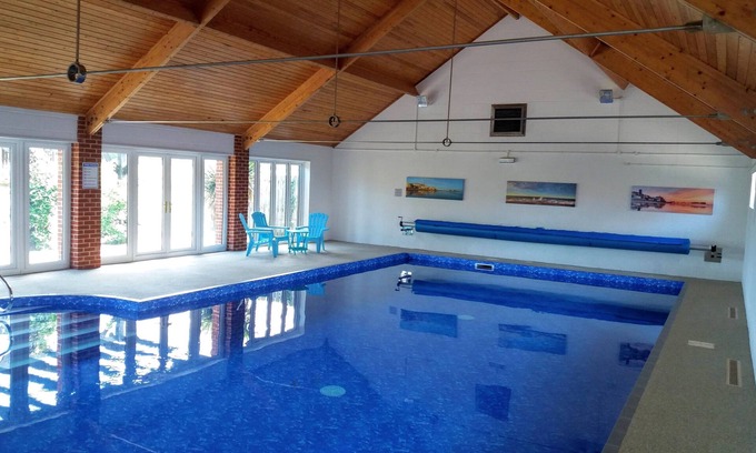 Aldborough Maison | Belle grange spacieuse n ° Cromer. Jardin clos. Piscine intérieure partagée et aire de jeux