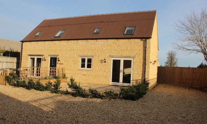 Bourton Cottage | Belle grange de vacances Cotswold à distance de marche des restaurants / magasins