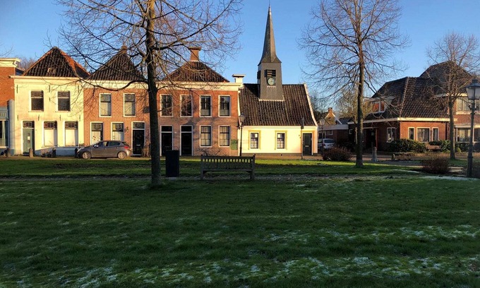 Bad Nieuweschans Maison | Encantadora casa de vacaciones de 1871 con confort contemporáneo.