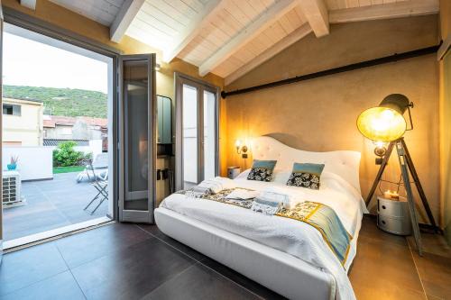 Gonnesa Lit Et Petit-Déjeuner | LUVIA ROOMS SPA