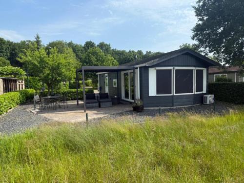 Papenvoort Chalet De Ski | Luxe chalet met uniek vrij uitzicht op rustig park in Papenvoort DRENTHE