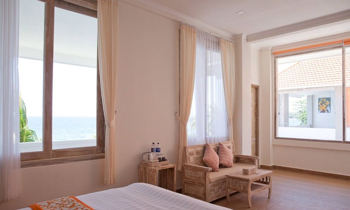 Bondalem Appartement | Chambre Double Luxe avec baignoire vue sur la mer sur la véranda
