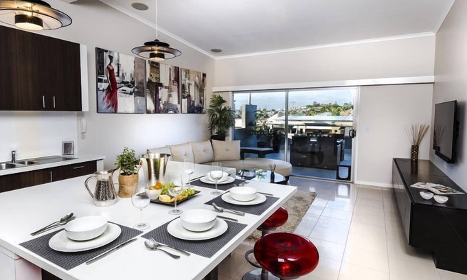 New Farm Appartement | Un des deux, boutique appartement au dernier étage avec terrasse extérieure