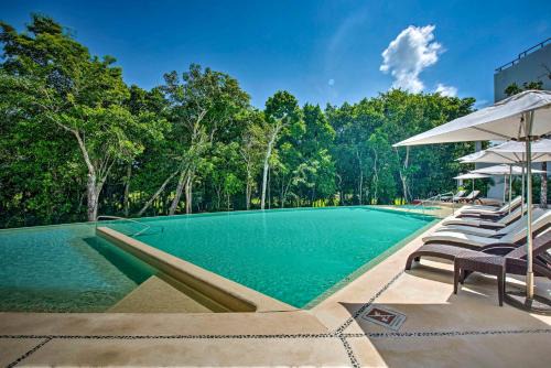 Akumal Appartement | Luxe Tao Riviera Resort Condo with Beach and Golfing!