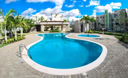 Llanos de Gurabo I Appartement | Luxurious 3-Bedroom Apartment with Pool & 24/7 security