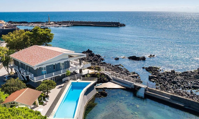 Scillichenti Villa | Luxurious sea front villa with private pool