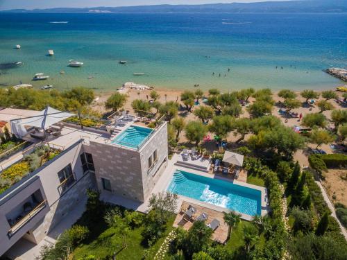 Omis Villa | Luxury beachfront VILLA FLORES heated outdoor, indoor pool, whirlpool, sauna