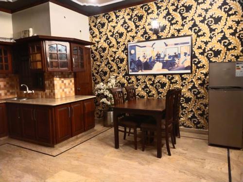 Gulshan-E-Jamal Maison | Luxury Guest House Near Agha Khan, Karachi Airport