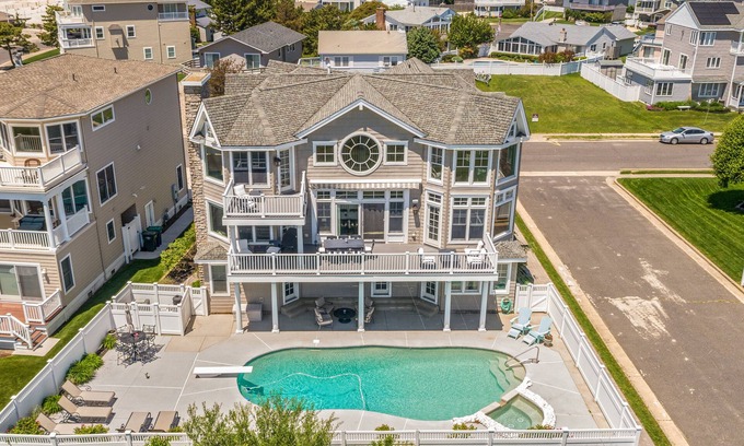 Southend Maison | Manoir de luxe face à l'océan avec piscine chauffée, ascenseur, grill et suites à gogo