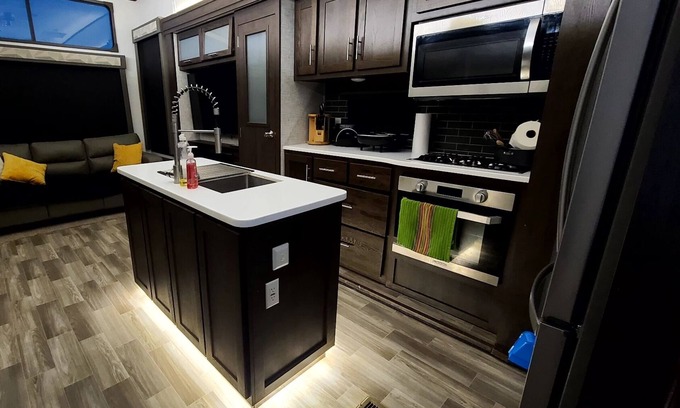 Eagle Pass Maison | Luxury RV with full kitchen sleeps family of 6 inside fenced property