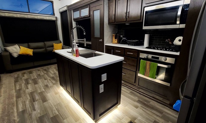 Eagle Pass Maison | Luxury RV with full kitchen sleeps family of 6 inside fenced property