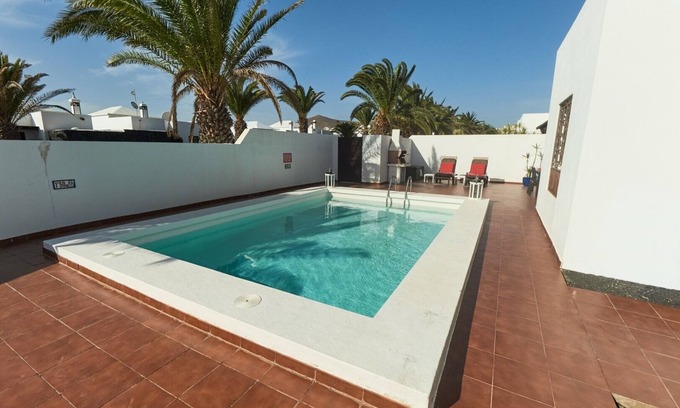 Costa Teguise Villa | - Villa de luxe avec piscine privée chauffée, Internet. Aucune voiture requise. Emplacement calme
