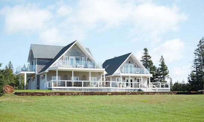 Clinton Maison | Luxury Water View Home With 2 Living Spaces, Hot Tub & Access To River