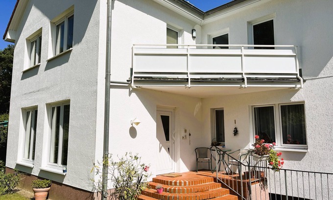 Neubukow Appartement | M9 Holiday apartment with balcony on the edge of the forest in Ostseeland - 4-room apartment, wood-burning stove, balcony (max. 6 persons)