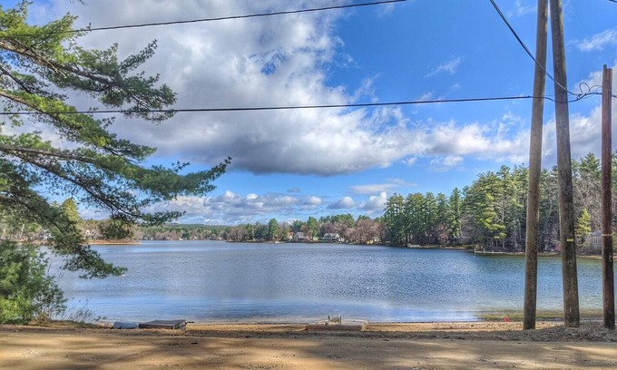 Lochmere Maison | Makin' Waves on Silver Lake with sandy beach and dock