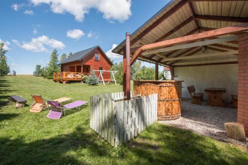 Linia Cabine | Malinowa Przystań domek drewniany z ruską banią