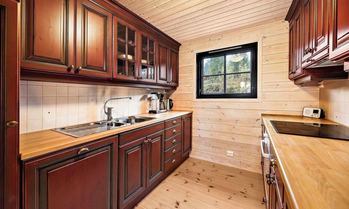 Vradal Maison | Marit's Hytte is a typical Norwegian holiday home, suitable for 6 to 8 people. Enjoy the fantastic view from the spacious veranda of this house.