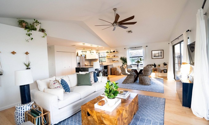 Spring Hill Maison | MarshaMellow A modern gulf coast Home!!! Fire pit, paddle boards, gas grill.
