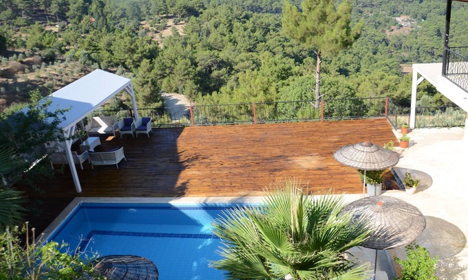 Ortaca Villa | Melisa Villa avec vue sur la mer piscine privée et jardin toutes les chambres sont climatisées