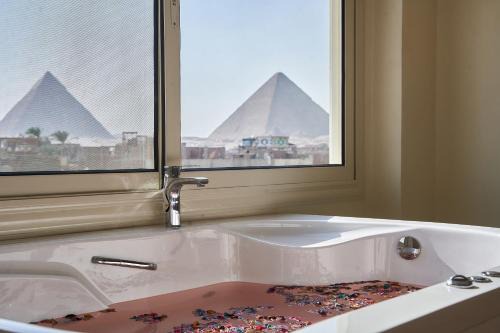 Kafrat al Jabal Hôtel | Merak Pyramids Hotel