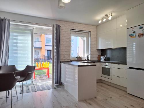 Gdansk Appartement | Mieszkanie 46m2 - 2 pokojowe z ogródkiem , WIFI , Bezpłatny parking nr 126, Szybkie połączenie z lotniskiem, autobus 120