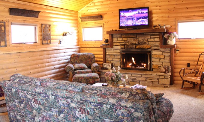 Sherrill Cabine | Cottage niché dans la vallée avec une vue magnifique sur le fleuve Mississippi.
