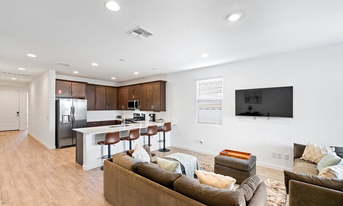 Goodyear Maison | Modern 3BR/2BA home in Goodyear with a community pool, pickleball courts, and EV charger! Less than a mile from Goodyear baseball stadium and close to other major venues, shopping, and golf courses!