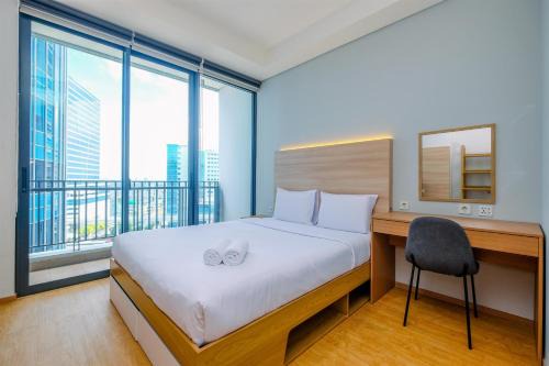 Mampang Prapatan Appartement | Modern and New 1BR across LRT Station Samara Suites Apartment By Travelio