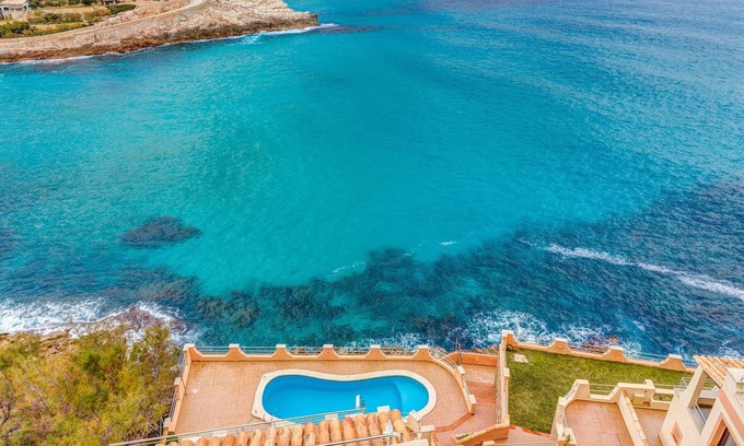 Cala Carbo Appartement | Logement de vacances moderne avec vue sur la mer, piscine, balcons, climatisation et Wi-Fi