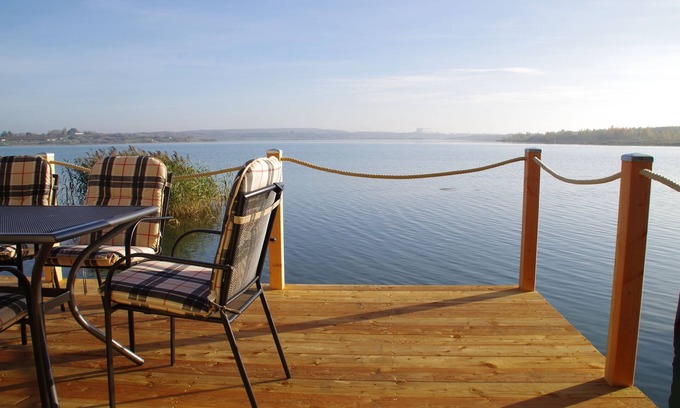Kahnsdorf Maison | Maison de vacances moderne directement dans le lac avec un bateau Hainer