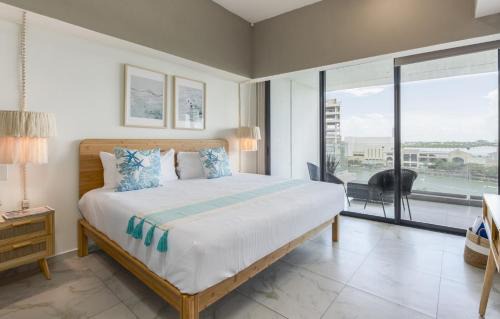 Merida Municipality Appartement | Modern Lakeview Condo with Pool and Gym by LAHOS