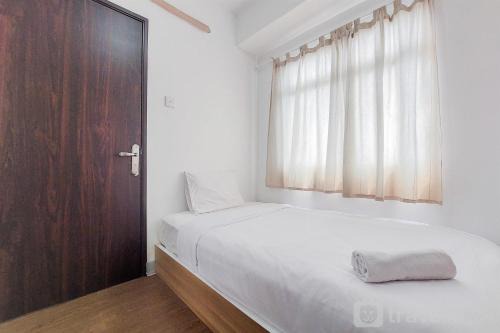 Serpong Appartement | Modern Look and Comfortable 2BR Serpong Greenview Apartment By Travellio