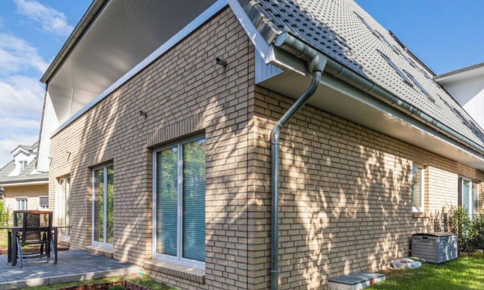 Timmendorfer Strand Appartement | Modern vacation apartment "Bikini Bottom" with garden. Dogs welcome!